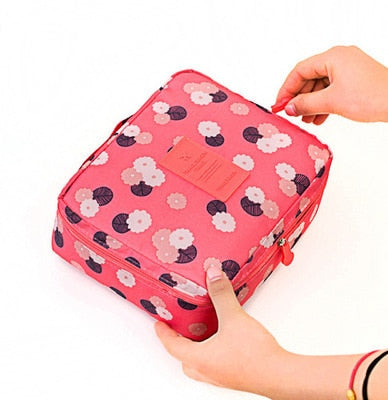 Elegant floral print compact waterproof makeup organizer, an essential beauty travel case for women.