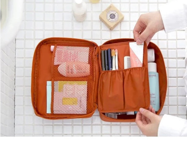 Compact waterproof makeup travel organizer for women, includes a free mini cosmetic case.