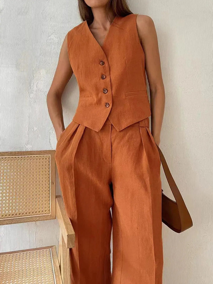 Effortless women's relaxed fit cotton linen two-piece set, featuring a stylish waistcoat & wide-leg pants.