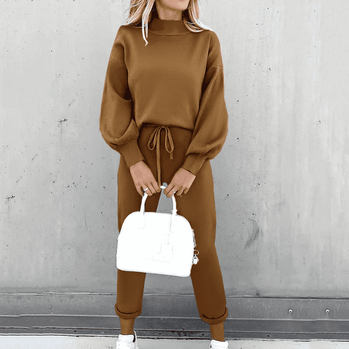 Modern women's comfortable two-piece loungewear. Relaxed fit turtleneck top & high-waist pants for ultimate comfort.