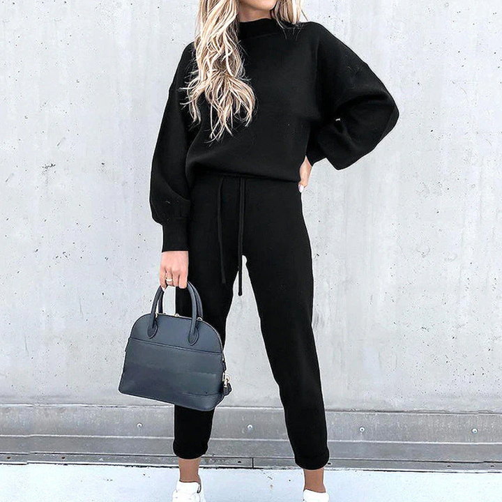 Elegant women's loungewear set. Comfortable high-waist pants & relaxed turtleneck top for cozy, casual style.