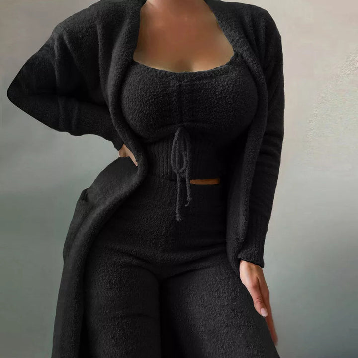 Women's cozy 3-piece knit lounge set with top, pants, and long cardigan. Perfect for relaxation and casual wear.