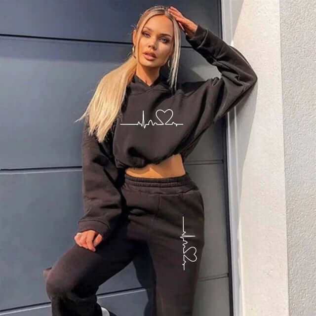 Women's cozy activewear set: soft hoodie and stretchy leggings perfect for lounging or light activities.