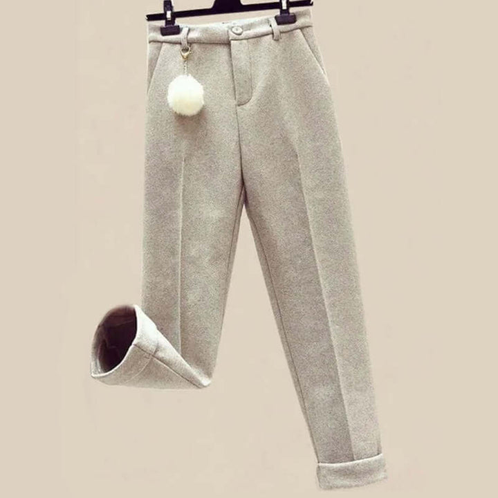 Comfortable women's beige knitted lounge set with hoodie, perfect for relaxing at home or casual outings.