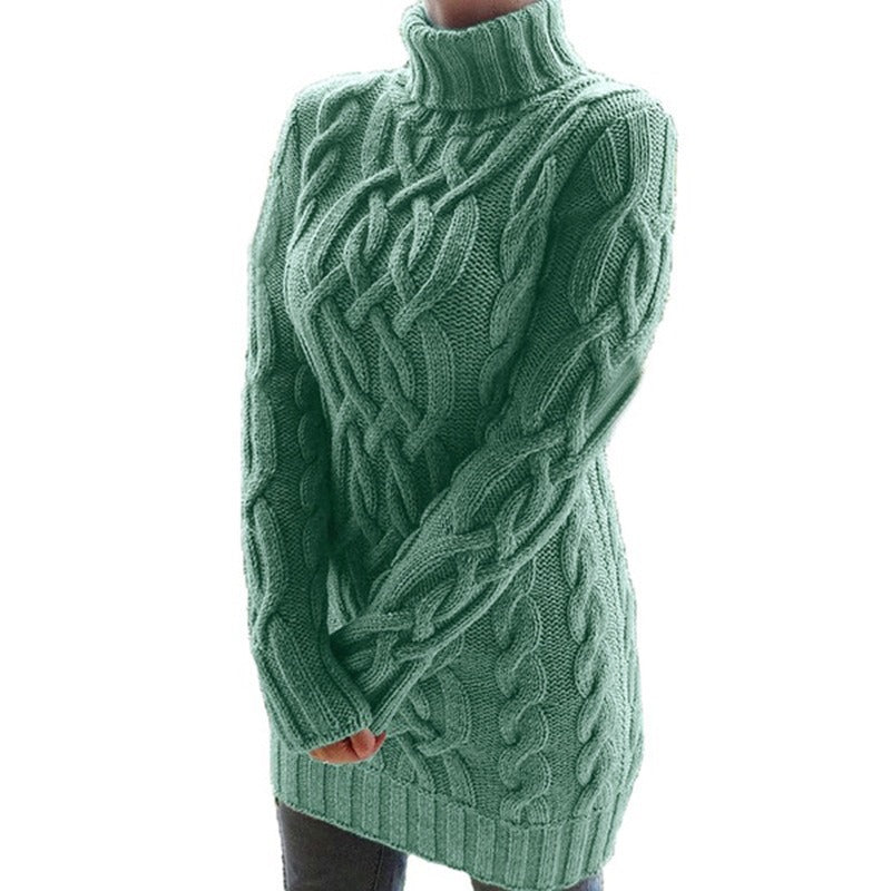 Women's cozy cable knit turtleneck sweater dress for elegant winter fashion.