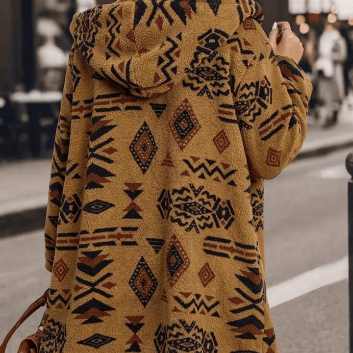 Relaxed fit camel hooded winter jacket for women. Cozy & warm outerwear, an essential stylish piece for winter protection.