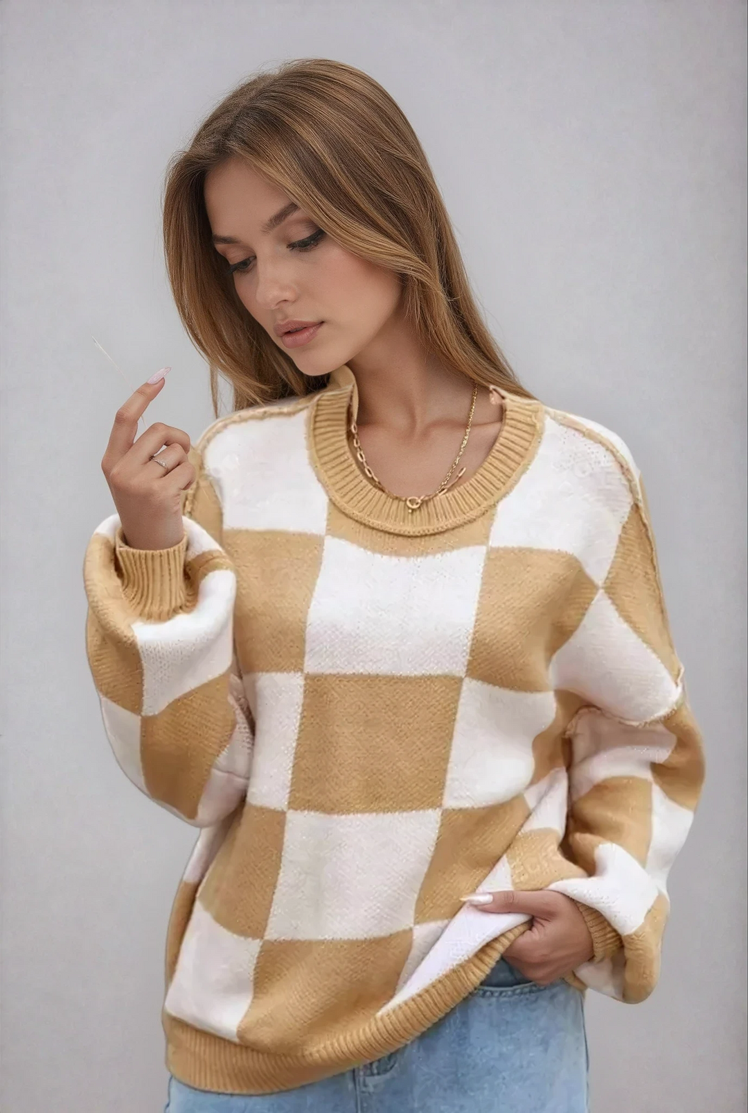 Women's cozy checkerboard sweater. Stylish, relaxed fit for fall & winter fashion.