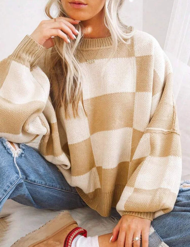 Women's warm checkerboard sweater. Relaxed fit for ultimate coziness & style.