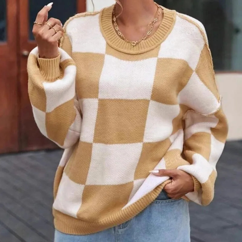 Trendy women's checkerboard sweater. Oversized, comfortable casual wear.