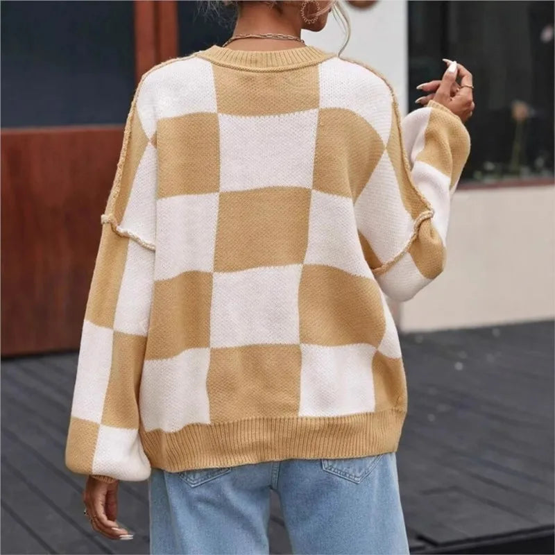 Stylish women's relaxed fit checkerboard sweater. Perfect for cozy fall outfits.