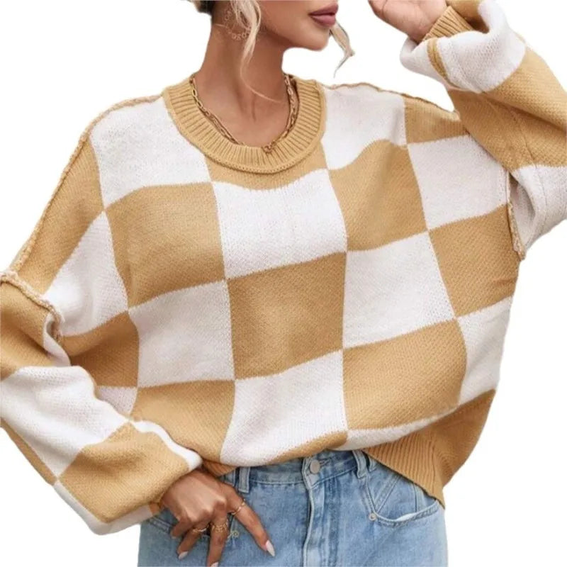 Cozy women's checkerboard sweater, a comfortable statement piece for winter fashion.