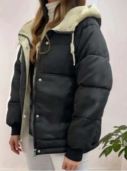 Women's cozy fleece-lined hooded jacket for warmth & style. Perfect winter outerwear.
