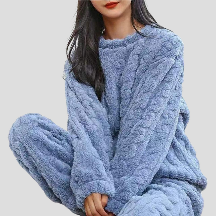 Women's cozy fleece pajama set in a relaxed fit, perfect for warm winter loungewear and comfortable sleep.