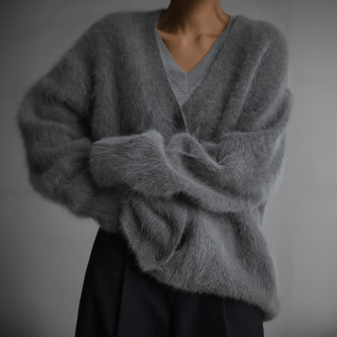Premium women's cozy fluffy knit cardigan sweater with a relaxed fit for ultimate comfort.