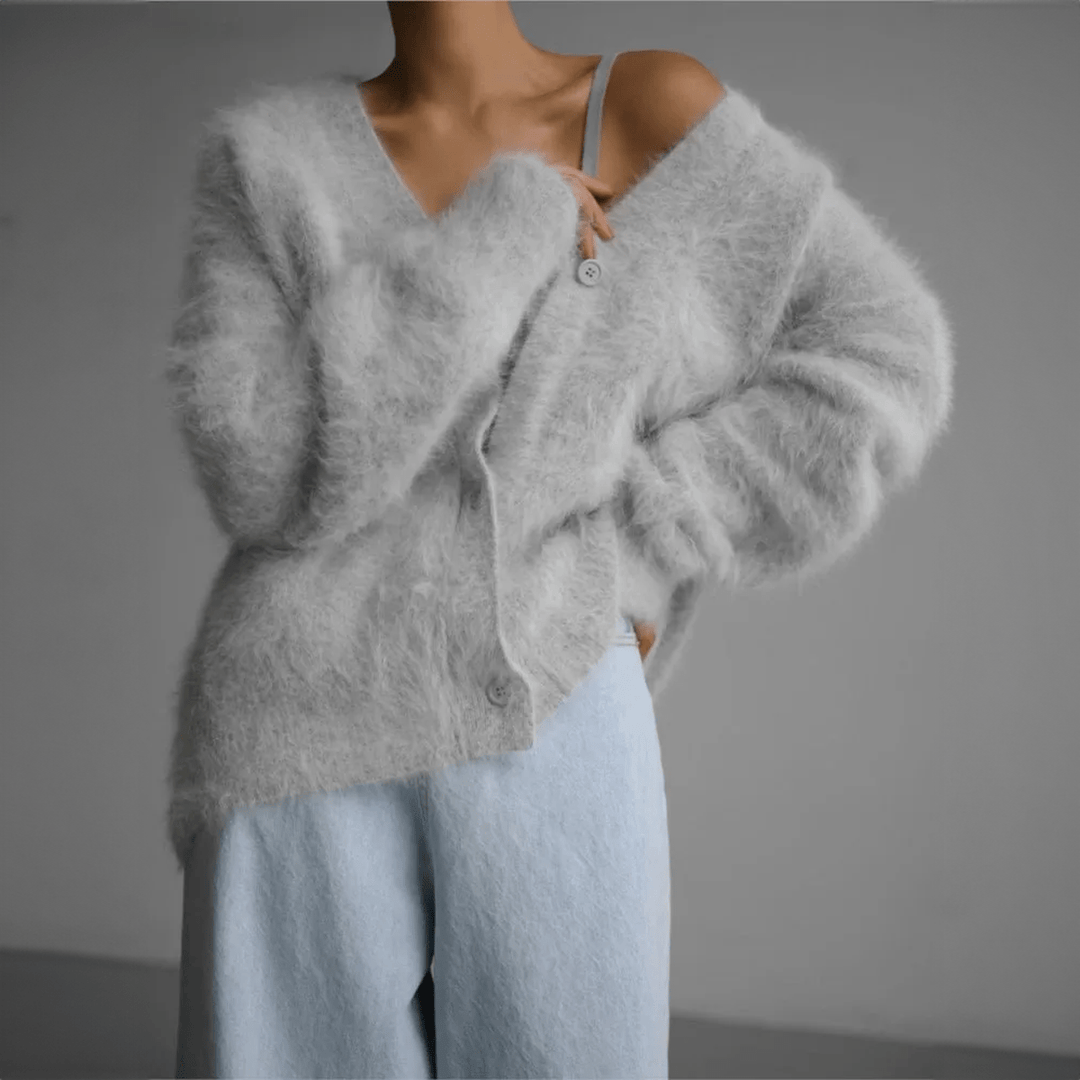 Chic v-neck fluffy sweater, a cozy women's knit cardigan ideal for winter fashion.
