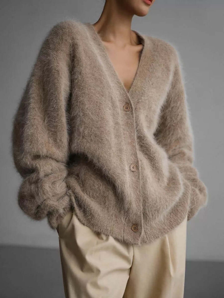 Women's cozy fluffy knit cardigan sweater, long sleeve open front, perfect for winter layering.