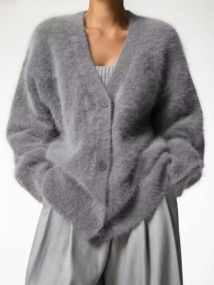 Stylish women's fluffy knit cardigan sweater, long sleeve and open front, a cozy winter fashion essential.