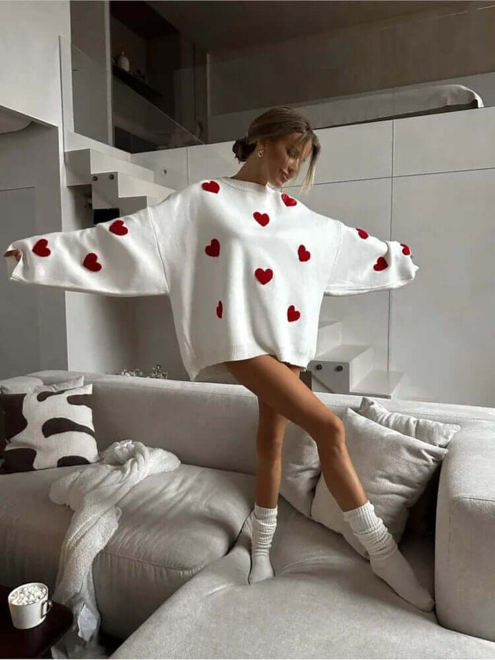 Comfortable knit women's sweater in a loose fit with heart print, great for everyday fall & winter fashion.