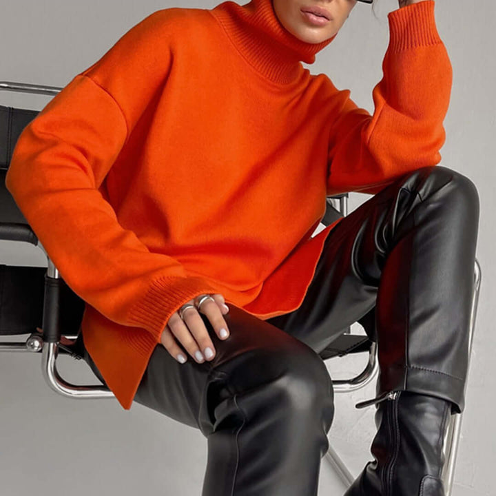 Close-up of a soft women's high-neck sweater, a warm long sleeve pullover for autumn comfort.
