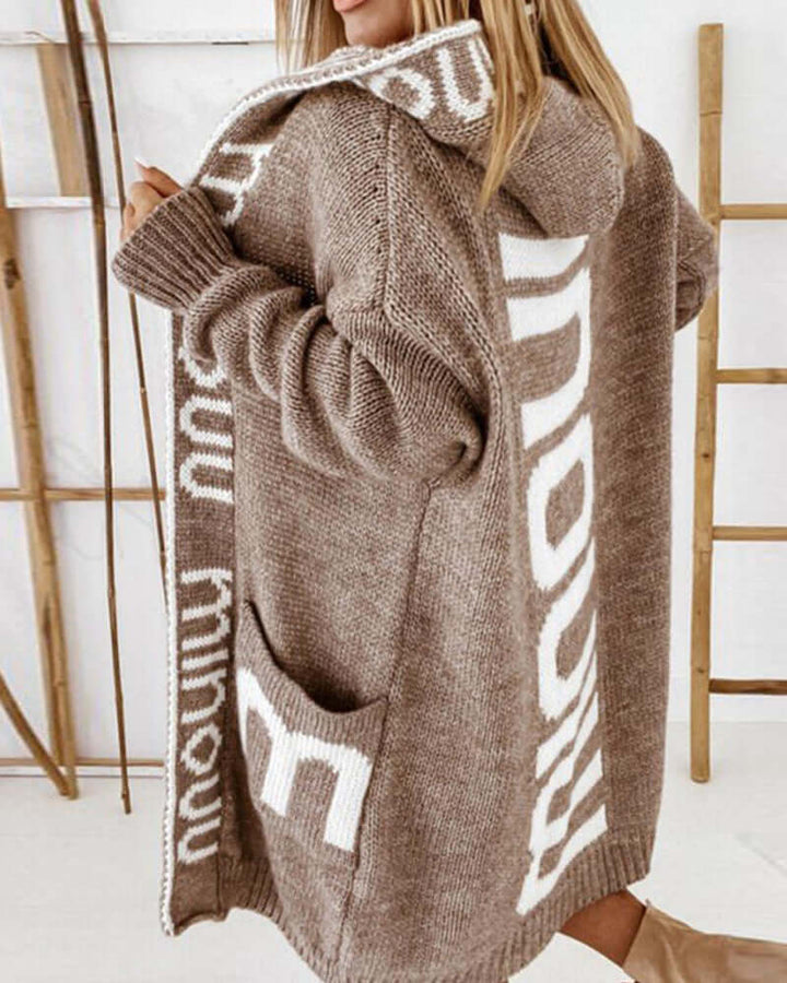 Women's cozy hooded cardigan, soft knit for comfortable everyday wear and effortless style.