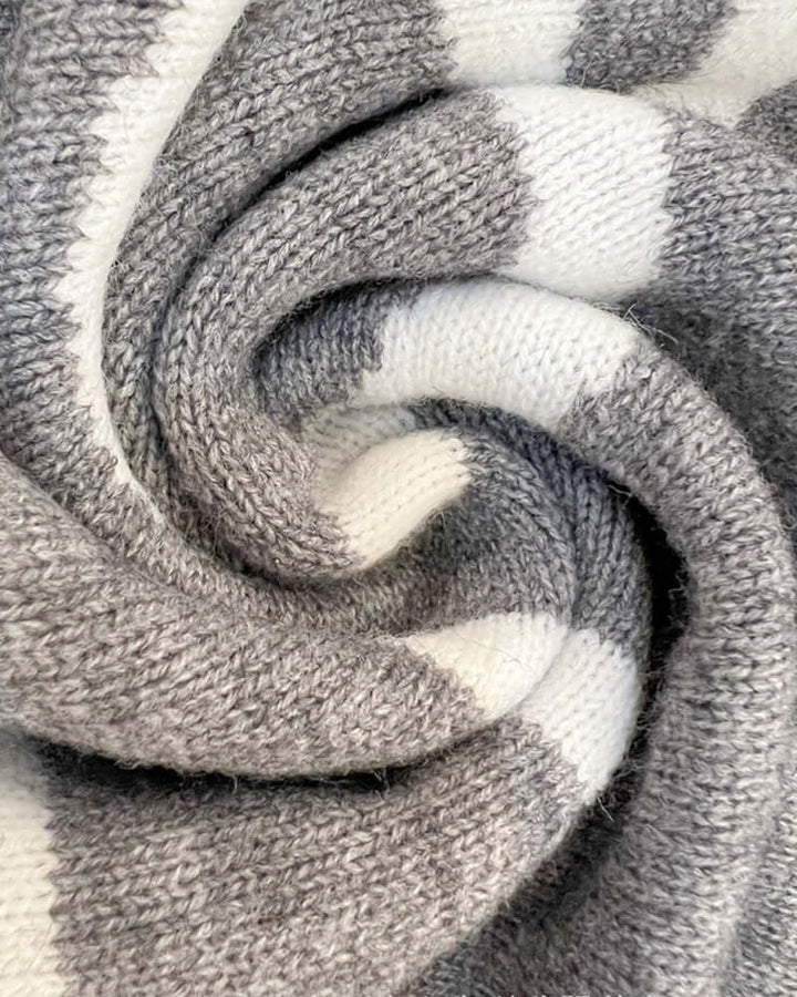 Warm women's hooded cardigan, a cozy winter wear layering piece with effortless style.