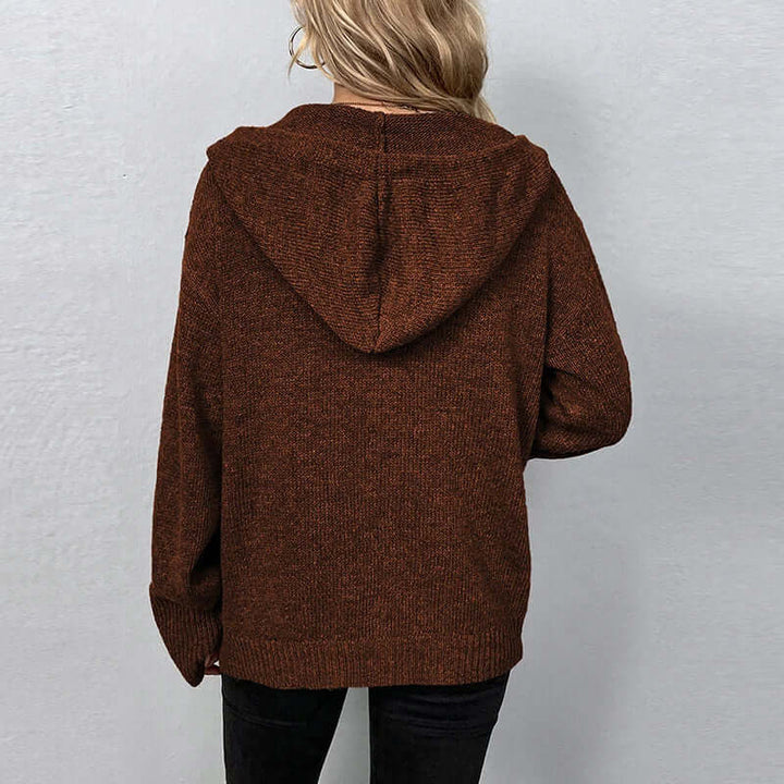 Stay warm with this women's cozy hooded knitted cardigan, essential winter wear.