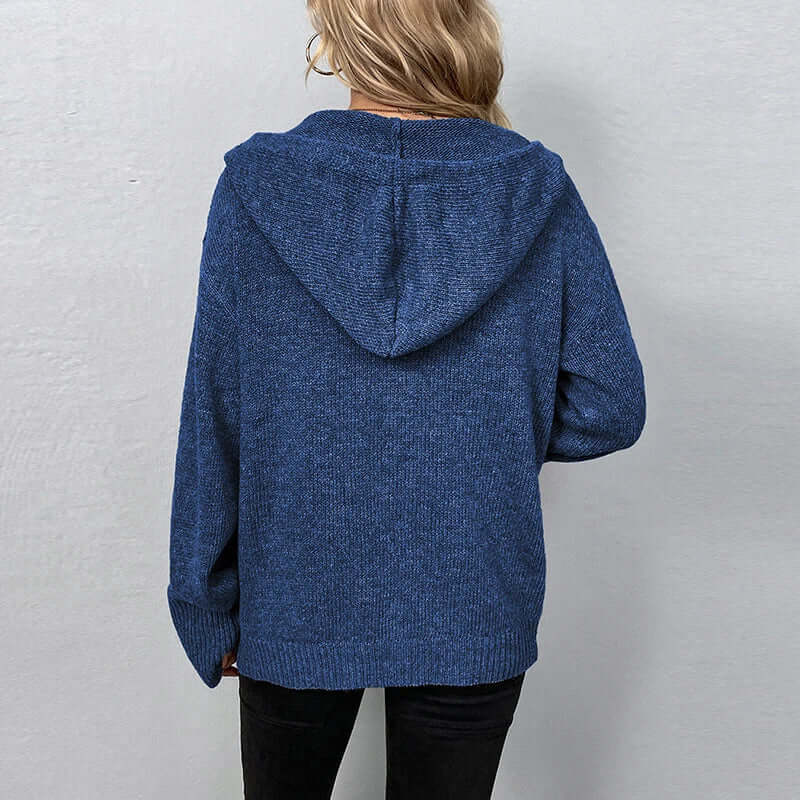 Effortless style: women's hooded knitted cardigan, ideal for fall layering outfits.