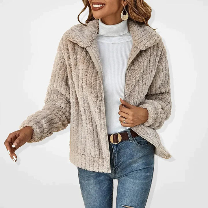 Women's Cozy Insulated Fleece Vest in Ember, perfect for layering during chilly fall and winter days.