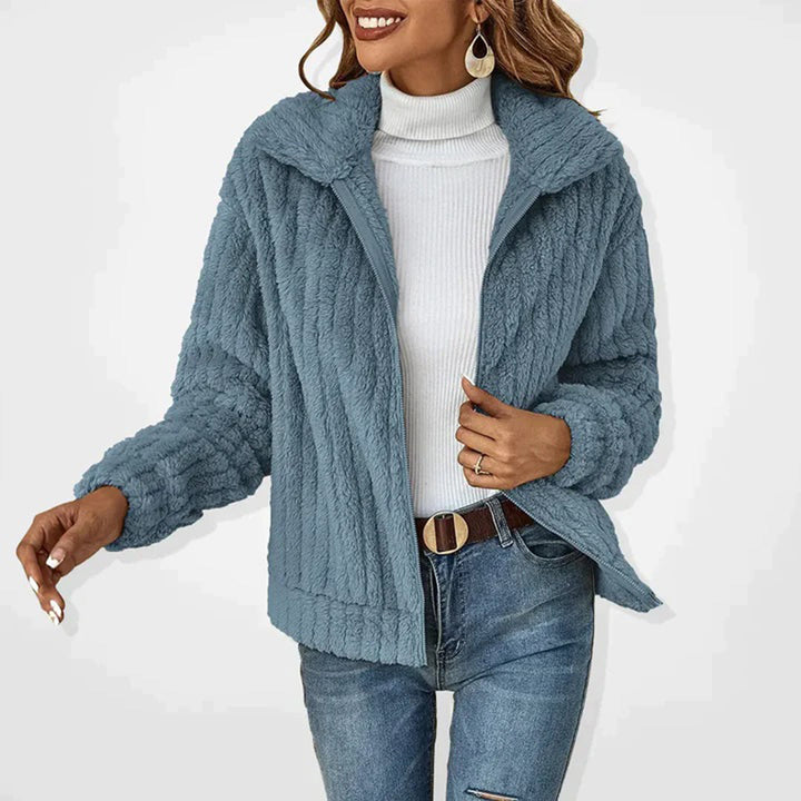 Chic women's apricot fleece vest, sleeveless and warm, ideal for casual everyday fall and winter fashion.