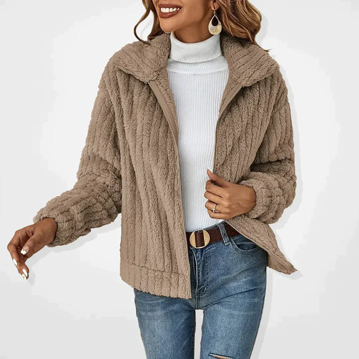 Navy blue women's cozy fleece vest for layering, an essential warm outerwear piece for everyday style.