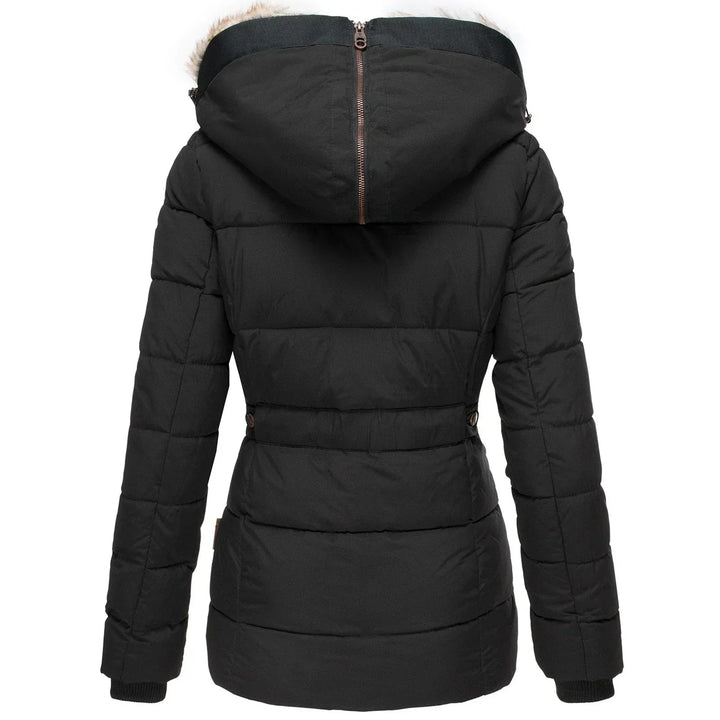 Cozy women's insulated puffer jacket. Super warm winter outerwear, ideal for extreme cold. Quilted comfort.