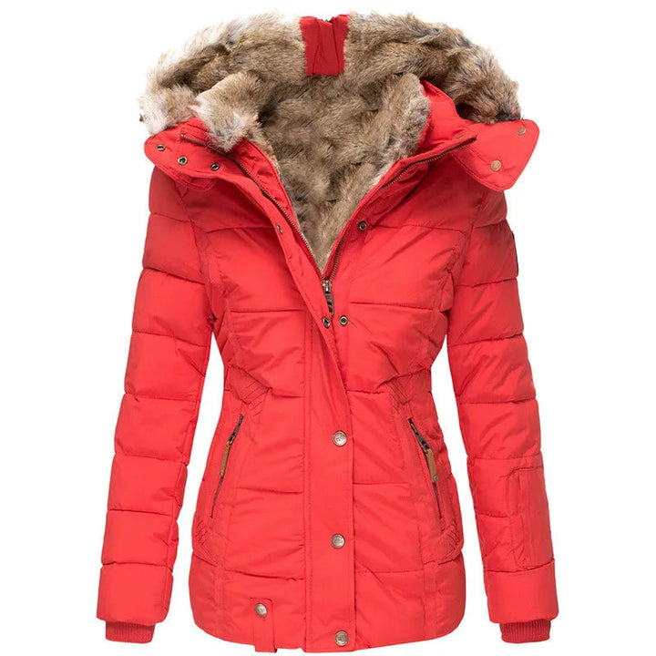 Quilted women's insulated puffer jacket. Fashionable winter outerwear, super warm & cozy with a modern design.