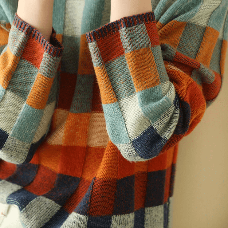 Back view of a women's warm, long sleeve high collar knit jumper. Cozy pullover sweater for autumn & winter.