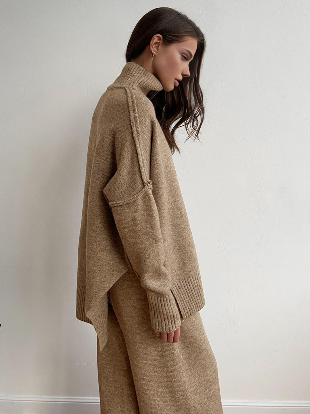 Relaxed fit women's knit loungewear set. Soft turtleneck top & wide-leg pants for ultimate cozy comfort.