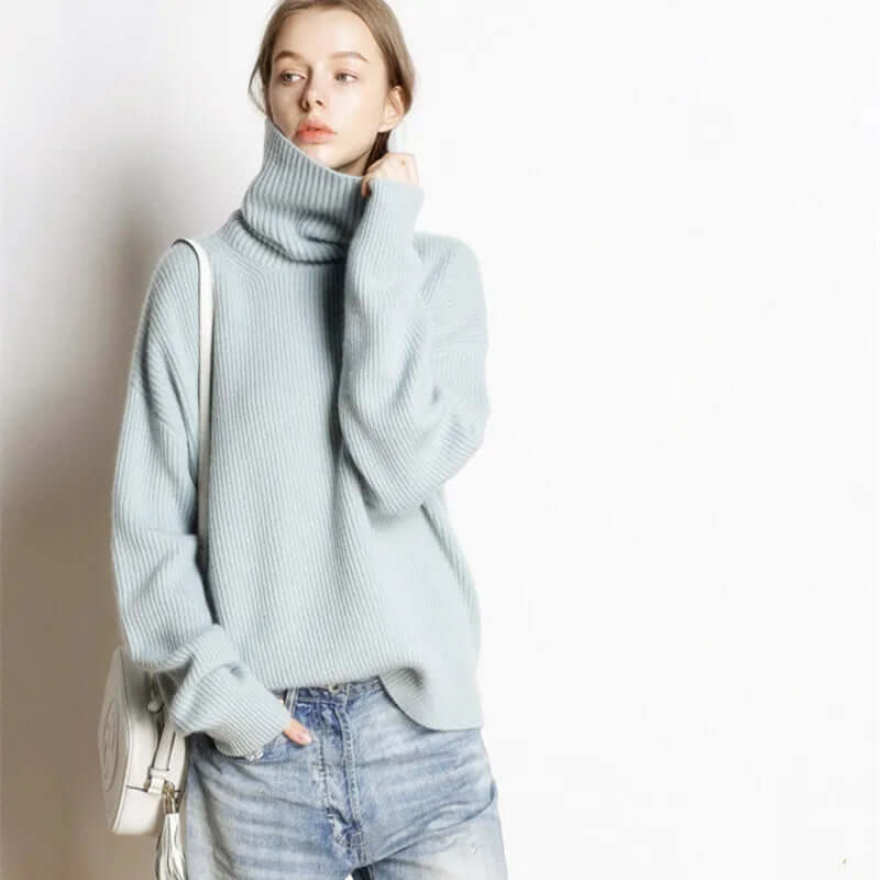Warm women's cozy knit turtleneck pullover sweater, an essential for stylish and comfortable winter outfits.