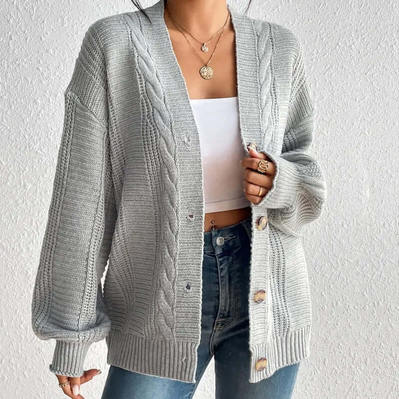 Women's cozy knitted cardigan sweater, perfect for warm, stylish layering in fall/winter fashion.