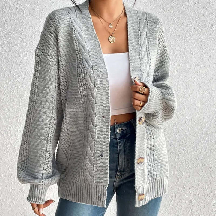 Women's cozy knitted cardigan sweater, perfect for warm, stylish layering in fall/winter fashion.