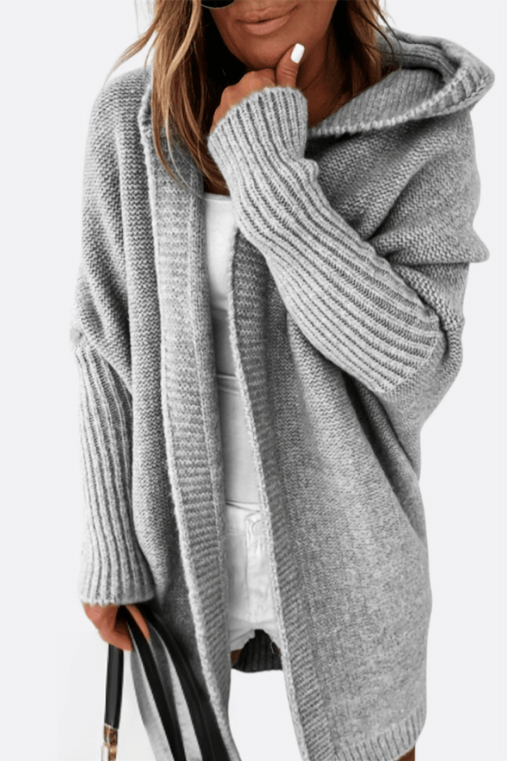 Gray women's comfortable knitted hooded jacket, perfect for casual winter warmth.