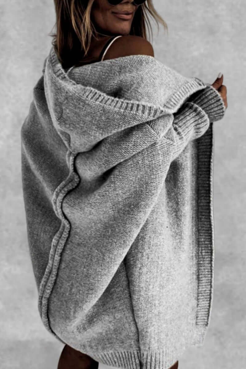 Black women's versatile knitted hooded coat, essential for effortless fall & winter style.