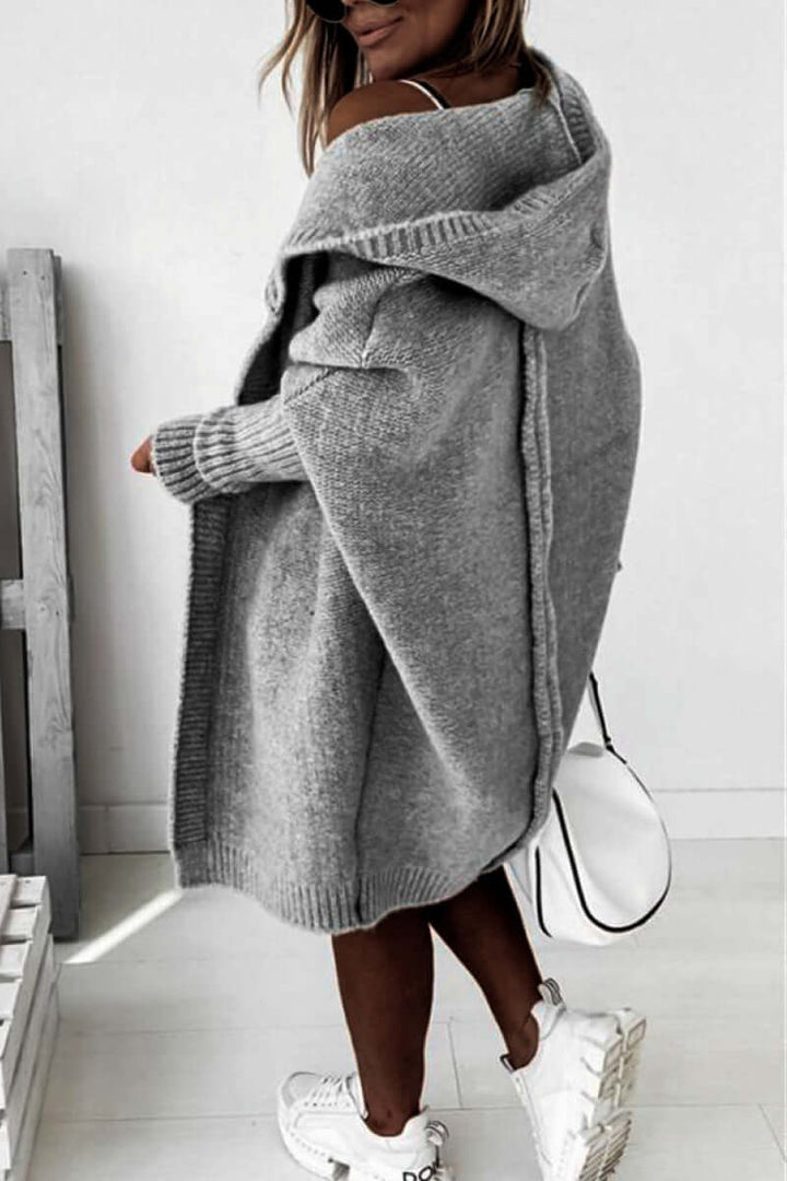 White women's cozy hooded coat, knitted for comfort & warmth in fall & winter.