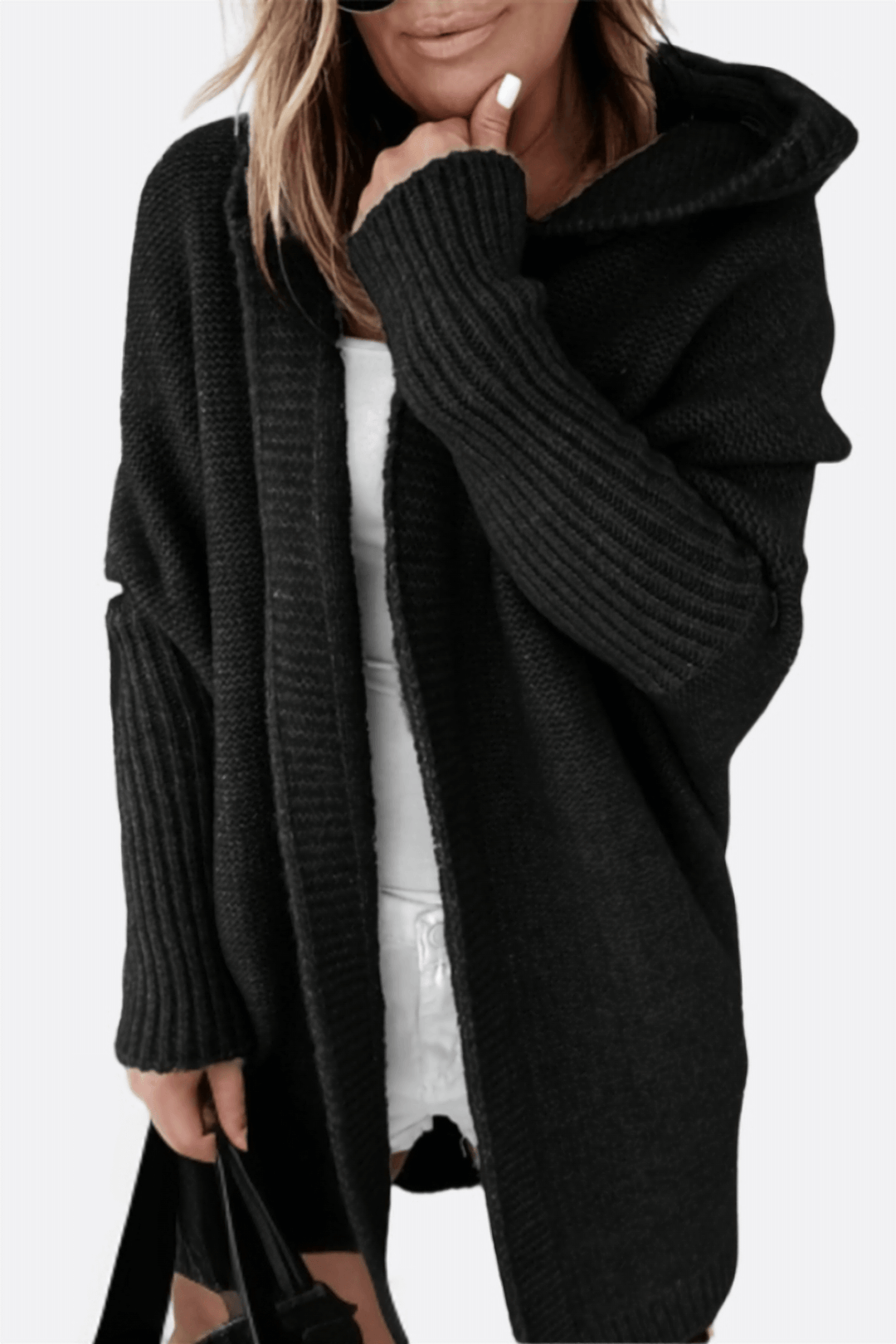 Ultra-cozy knitted hooded coat for women, offering warmth & comfort for fall & winter outfits.