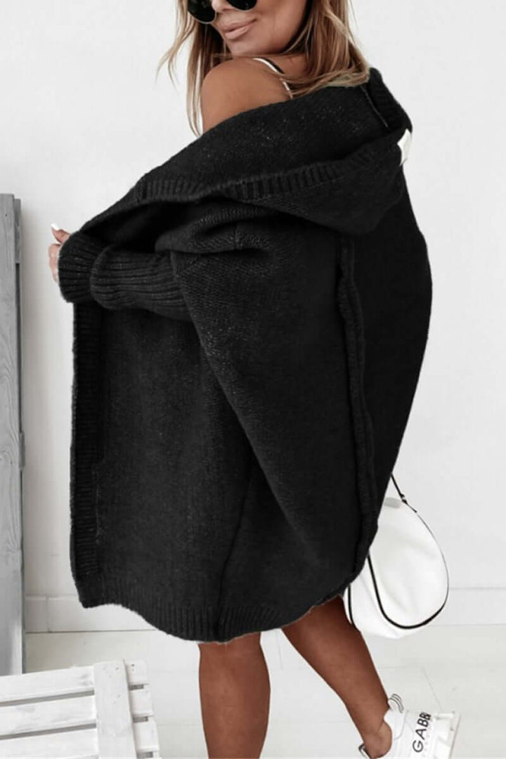 Effortlessly stylish women's hooded jacket, knitted for a chic fall/winter look & comfort.