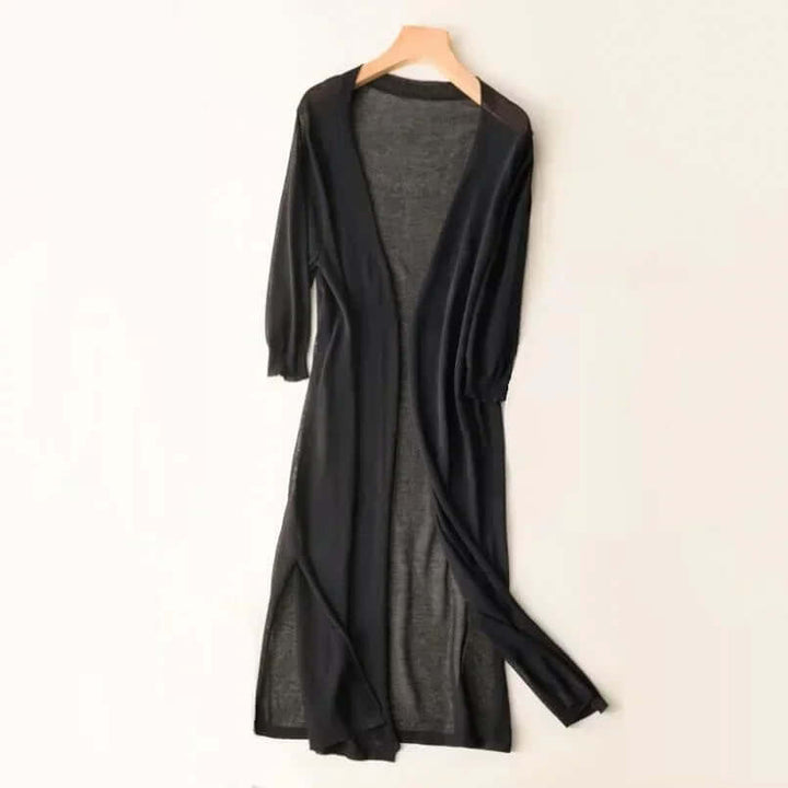 Chic women's seasonal long cardigan, offering a comfortable and elegant wrap style.