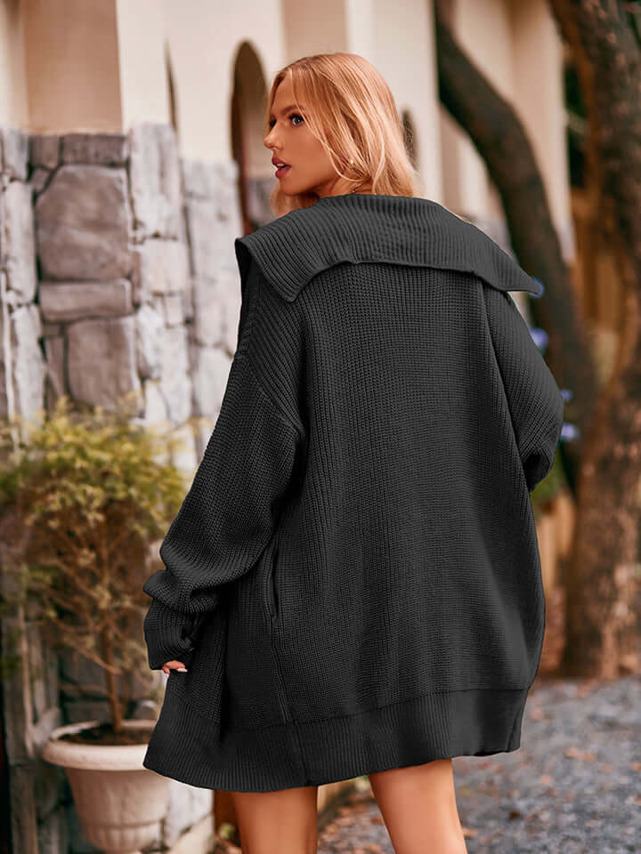Women's open-front knitted midi cardigan, cozy outerwear ideal for effortless layering.