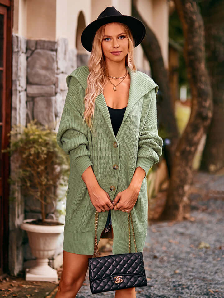 Women's casual knitted midi cardigan, perfect cozy outerwear for transitional weather layering.