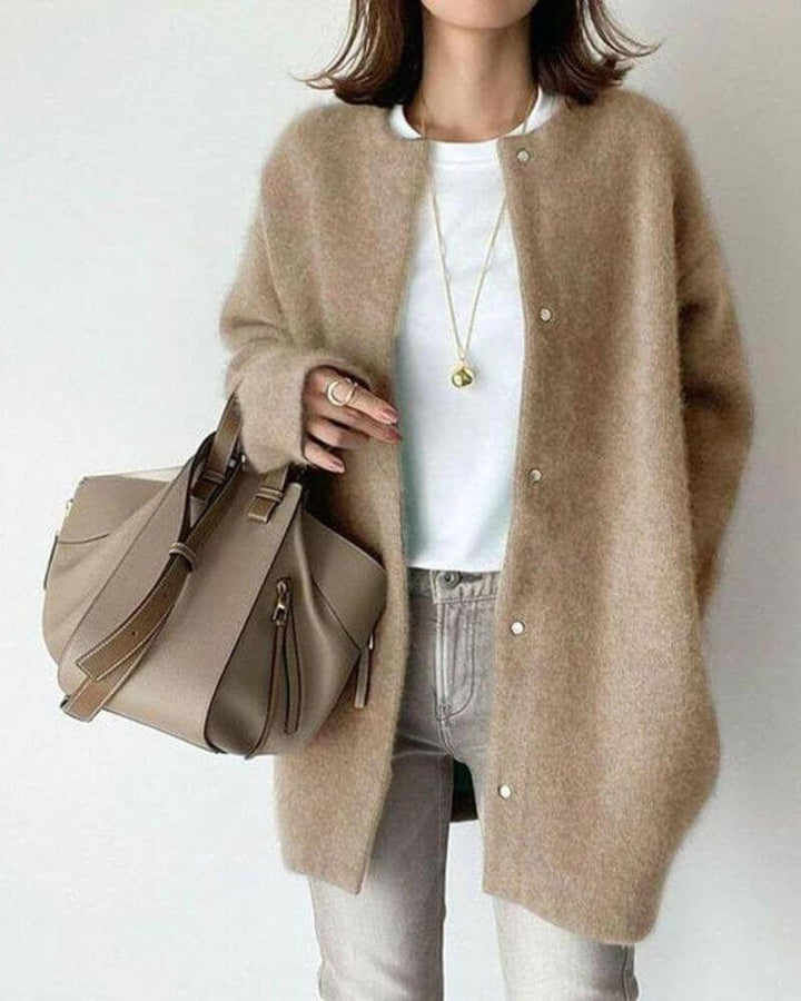 Warm & cozy women's knitted cardigan, a soft open-front sweater designed for ultimate comfort and stylish layering.