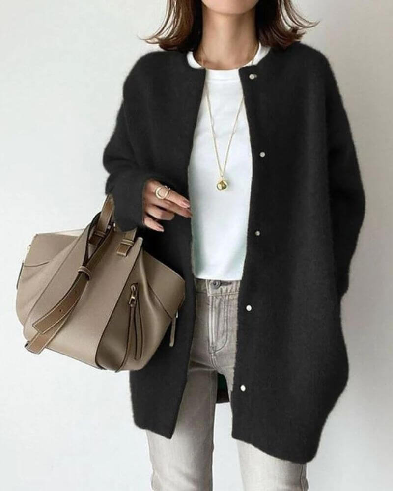 Stylish women's long-sleeve knitted cardigan, a cozy open-front sweater perfect for soft, warm comfort.
