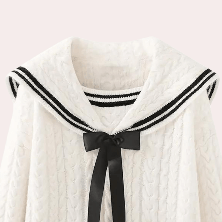 Stylish women's long sleeve knit sweater, providing casual comfort and warmth for fall.
