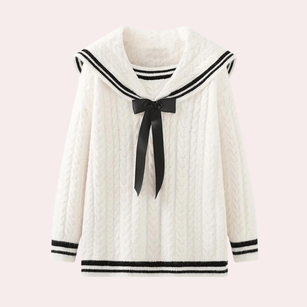 Close-up of a soft knitted women's sweater, showcasing cozy texture and quality.