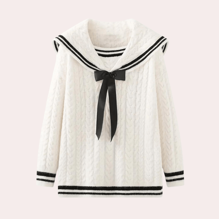 Close-up of a soft knitted women's sweater, showcasing cozy texture and quality.
